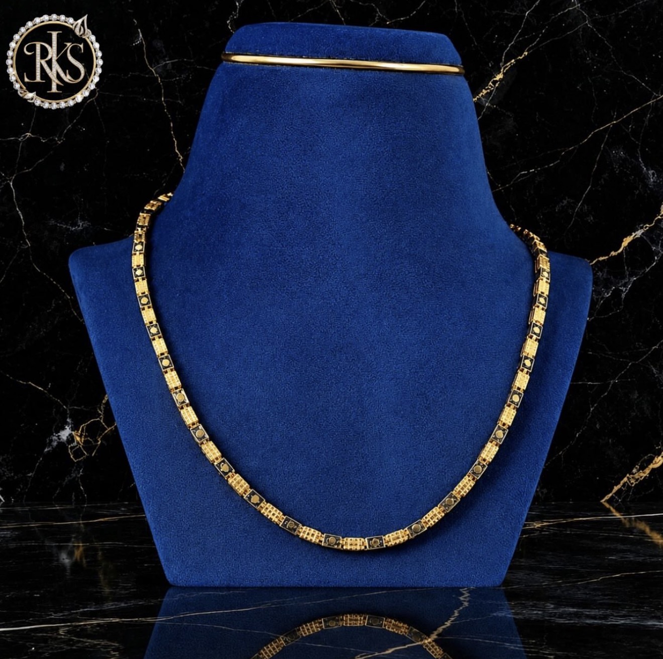 Gold link chain on navy display bust — Ramesh Kapoor & Sons Jewellers